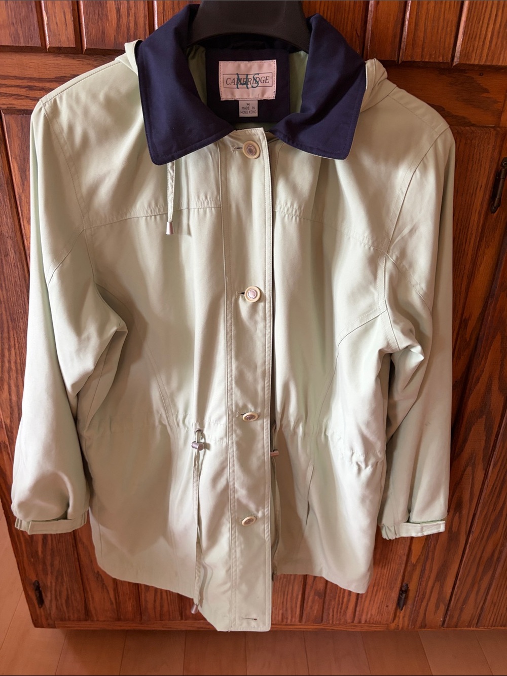 Light Green Hooded Parka with Navy Collar
Cambridge  Size Medium